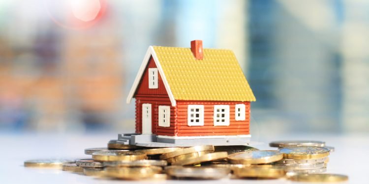 Real estate investment concept. House and money.