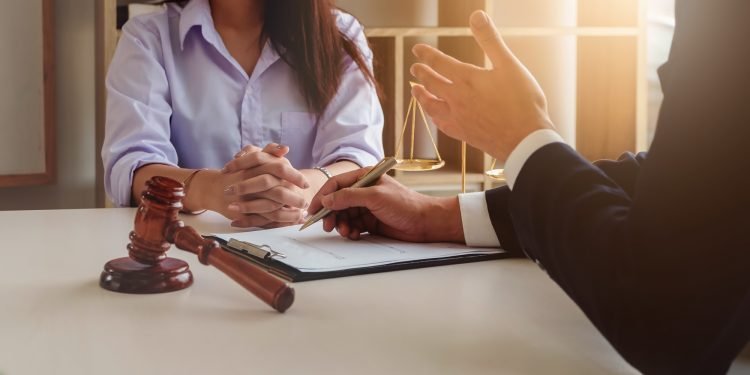 Law should know concept, The lawyer explained to the client to plan the case in court.