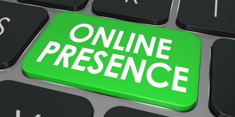 Online Presence words on a computer keyboard key or button to illustrate good website visibility on the Internet through good SEO or search engine optimization