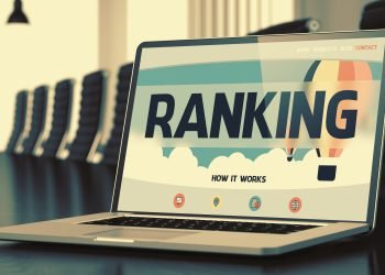 Ranking - Landing Page with Inscription on Mobile Computer Display on Background of Comfortable Conference Room in Modern Office. Closeup View. Blurred. Toned Image. 3D Render.