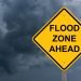 Flood Zone Ahead Caution Sign Storm Background